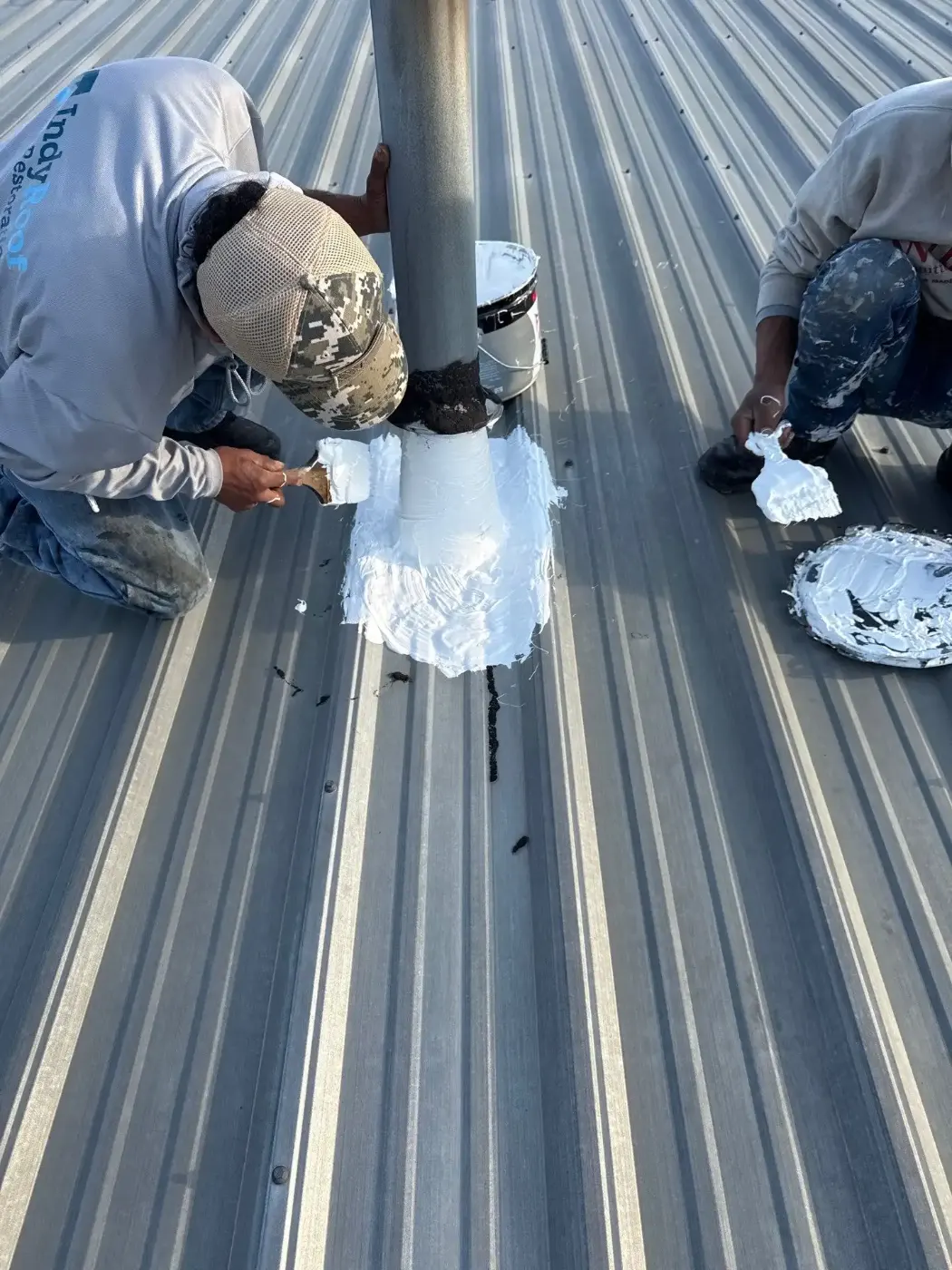 Tarping and dry-in on a Mulberry commercial roof